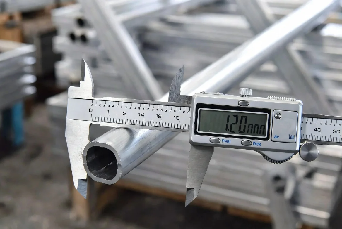Audit incoming materials - digital caliper inspection on aluminum frames