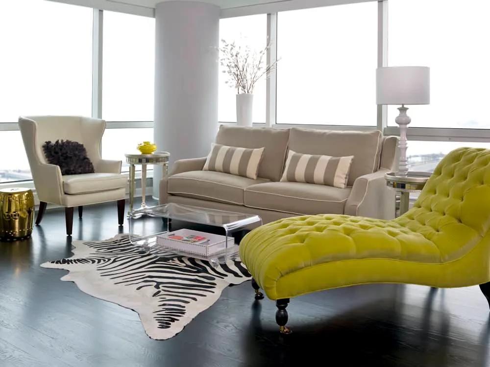 Upholstered chaise lounge and sofa together in a guest room, highlighting maintenance and replaceable parts