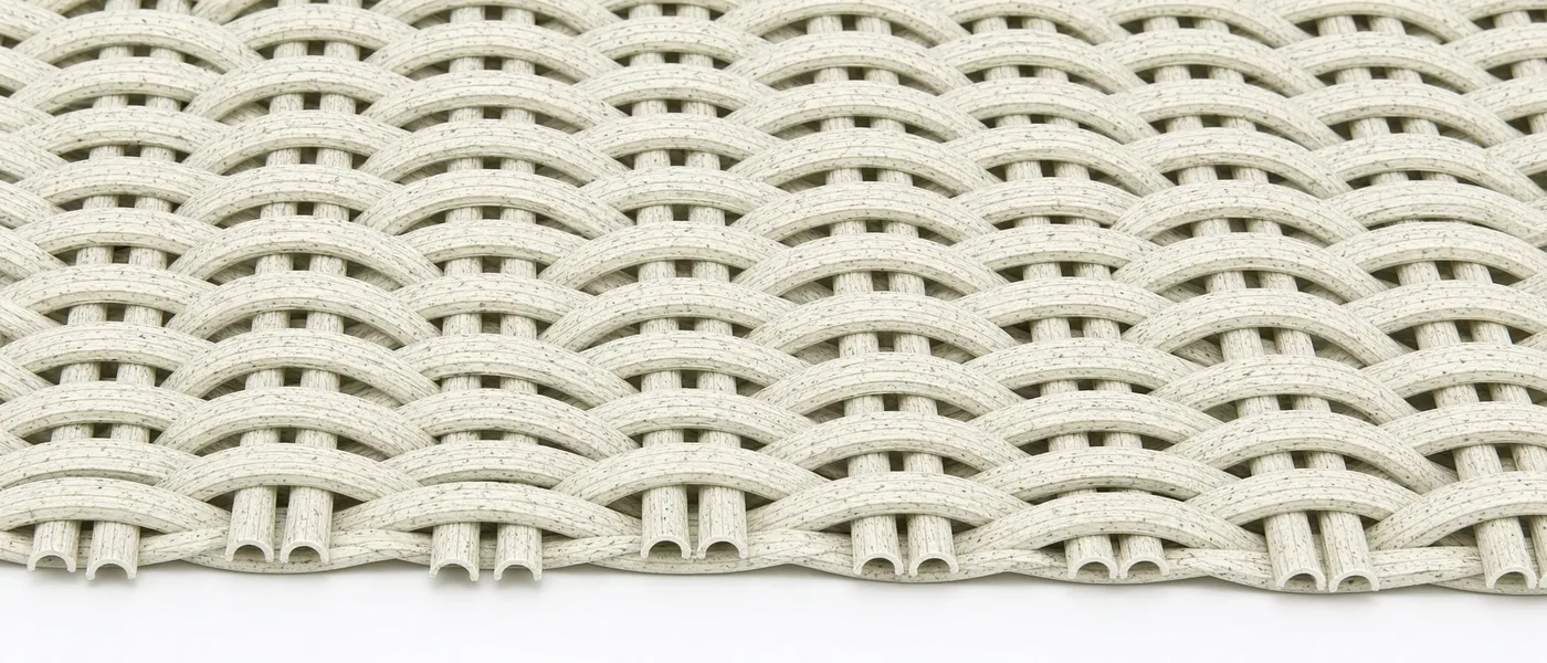 Close-up of a tight woven wicker panel showing strand density and weave consistency