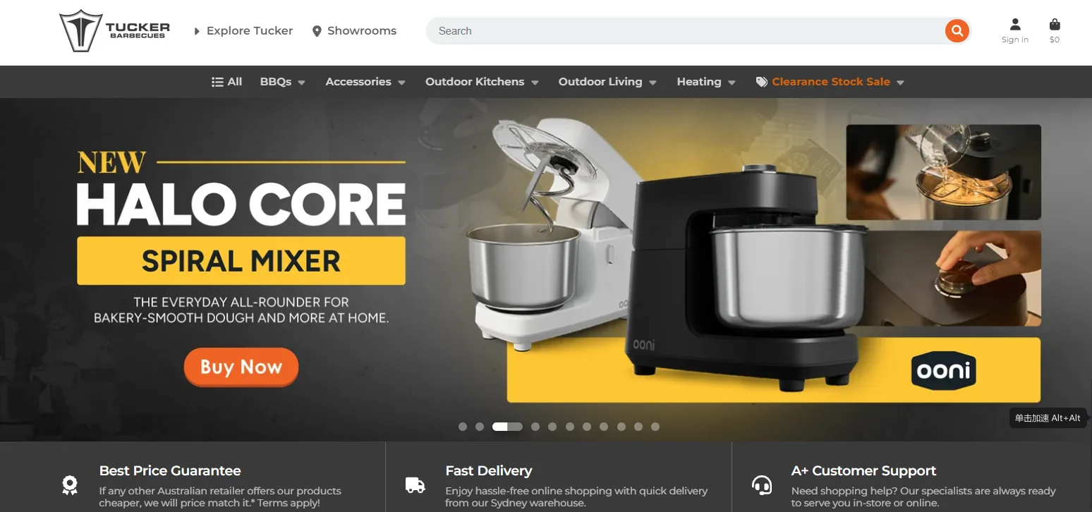 Tucker Outdoor Kitchens homepage banner promoting its new Halo Core spiral mixer, over a dark appliance hero with its Outdoor Kitchens and Outdoor Cooking navigation