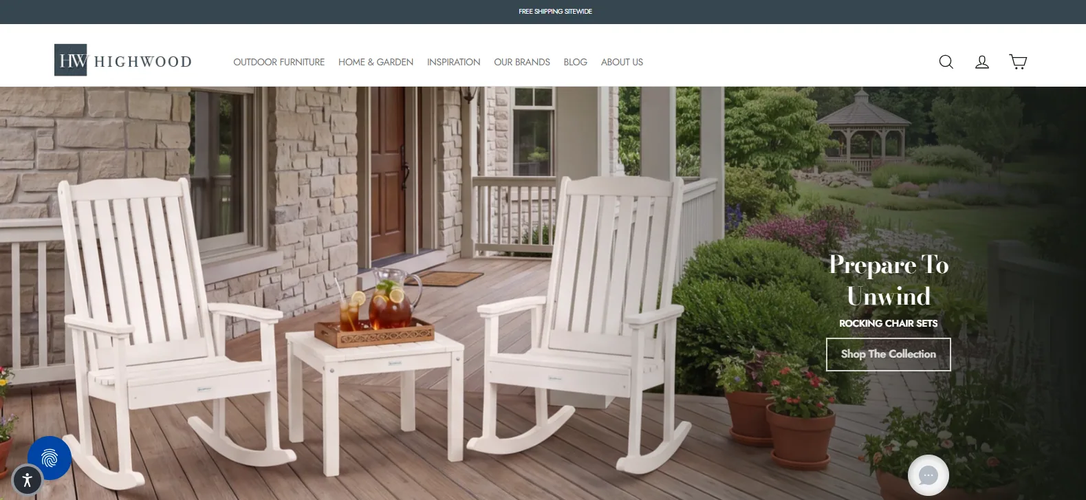 Highwood homepage hero showing two white Adirondack rocking chairs and a side table with a tray of iced drinks on a wooden deck, promoting its Rocking Chair Sets