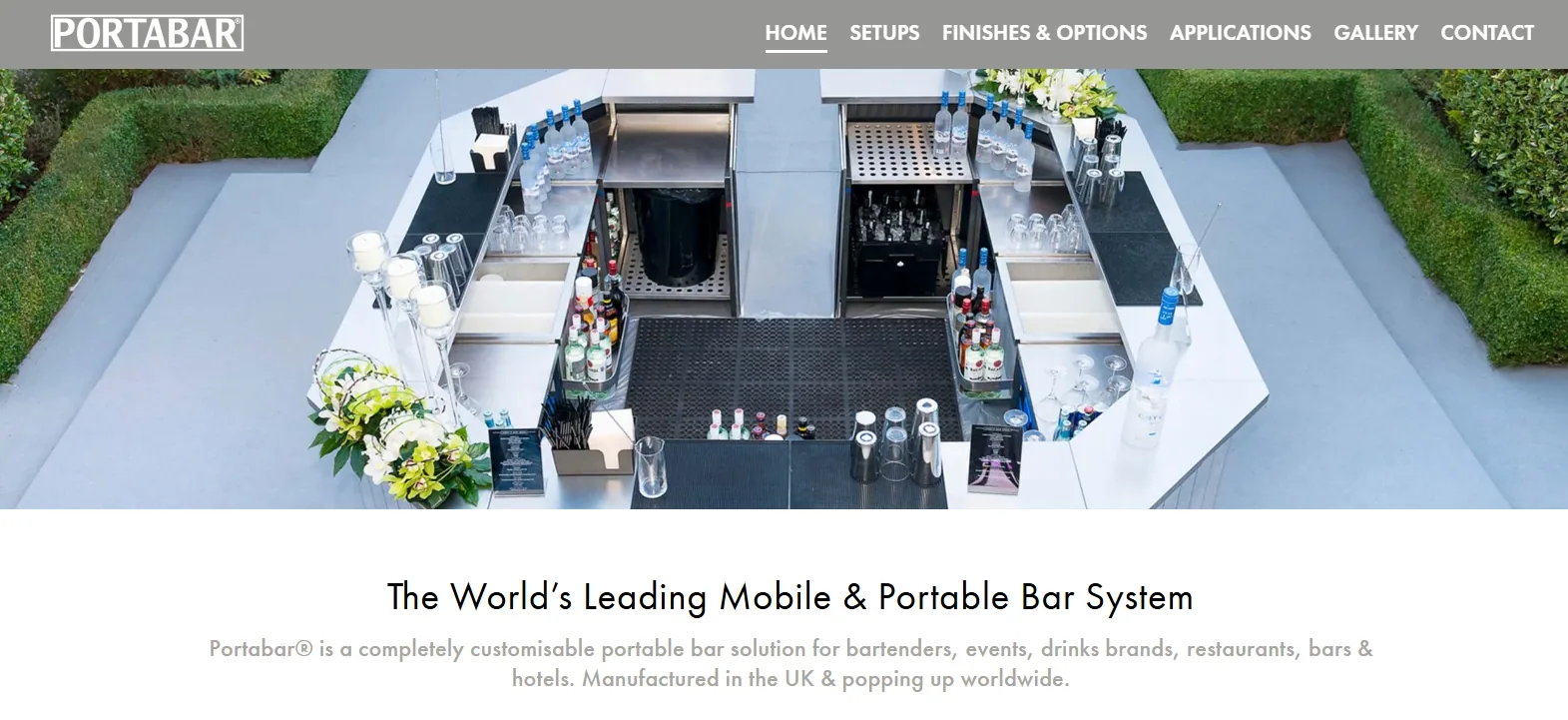 Portabar homepage showing a modular stainless-steel bar system from above on a paved terrace, with ice wells, speed rails, bottle holders and greenery, headed The World's Leading Mobile and Portable Bar System