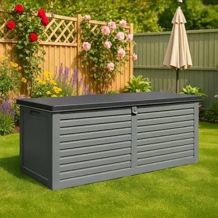 Courtyard storage zone with deck box and garden shed