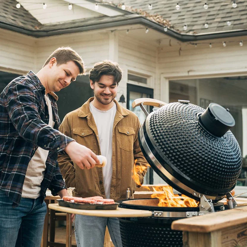 Kamado grill with premium accessories — outdoor cooking lifestyle