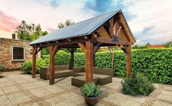 Custom outdoor pavilion with solid roof — open-sided backyard structure
